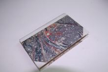A half vellum binding with 18th century marble paper sides,