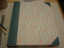 Large case binding, cloth spine and corners, Japanese paper sides.