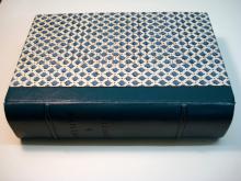 Quarter leather binding, decorative paper sides.