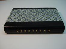 Half leather binding with Block printed paper sides.