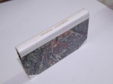 A half vellum binding with 18th century marble paper sides,