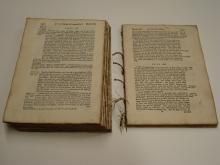 Sections of the book (halfway through pulling).