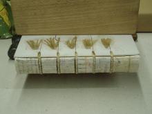 Drying, with slips inserted to stop the boards being pulled back as the cords dry and shrink.