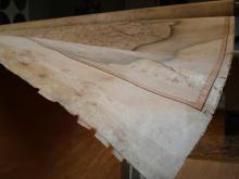Repairs to a large early 19th century map of Britain.