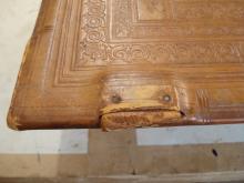 Remains of original strap before removal.