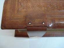 Detail of new strap attached to board to wooden board.
