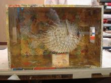 Large display case covered with dutch gilt paper.