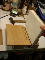 Boards attached to book and pegged