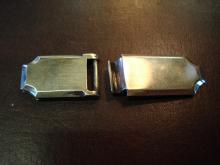 Handmade brass clasps.