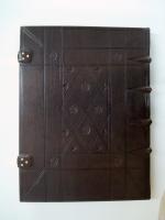 Back of finished book, tooled in blind in style of 16th century binding.